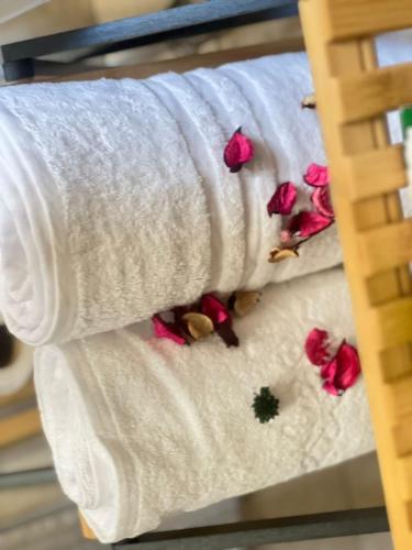 a group of towels with flowers on them at Peaceful stays in Mapungubwe in Johannesburg