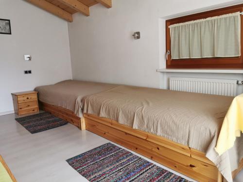 Postel nebo postele na pokoji v ubytování Hörtmairhof