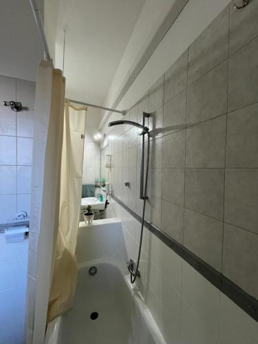 a bathroom with a bath tub and a sink at Bed and Breakfast Medaglia D'oro in Marcianise