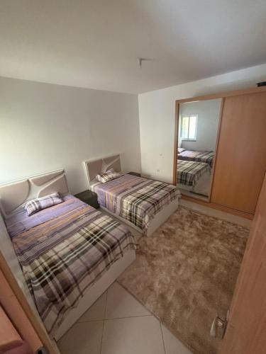 Llit o llits en una habitació de La casa de iman