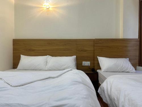 Llit o llits en una habitació de none star