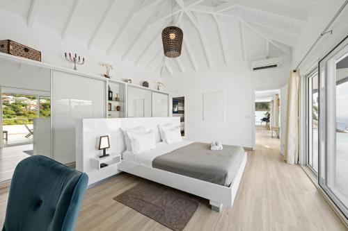 Säng eller sängar i ett rum på Villa Angel Sunset