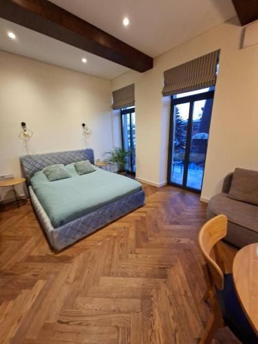 Llit o llits en una habitació de Viktor Nemuno house