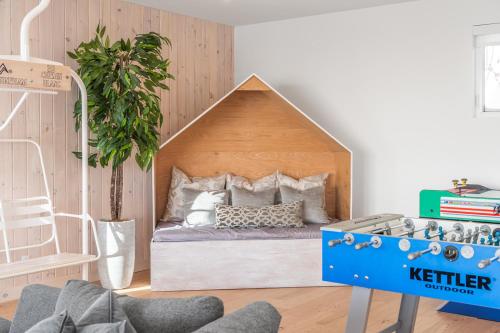 a bed in a play house in a room at 32 Chemin Blanc in Stoneham