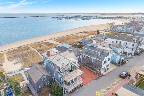 an aerial view of a house and the beach at The Grand On Commercial in Provincetown