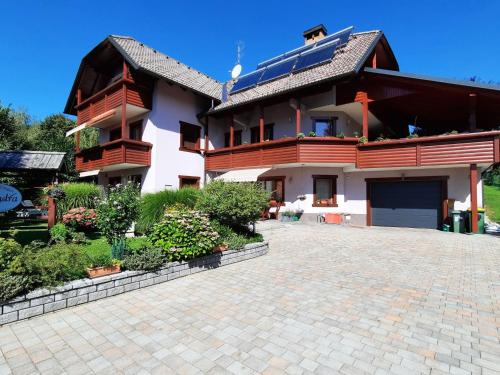a house with a brick driveway in front of it at Apartment mit Balkon by Interhome in Gorje