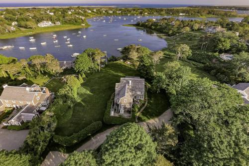 an aerial view of a large house on a river at Aweigh We Go in Chatham