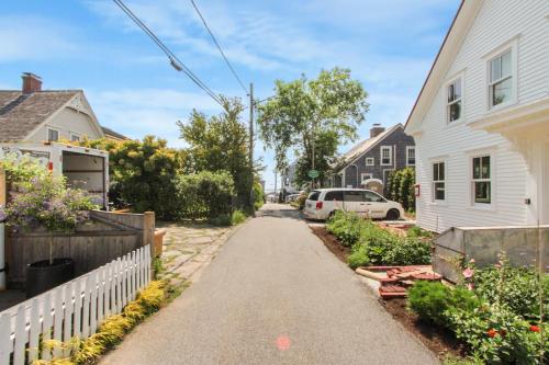 a street in a residential neighborhood with houses at Harbor Breeze Townhouse in Provincetown