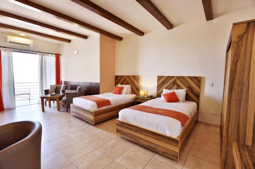 Llit o llits en una habitació de Dana Guesthouse
