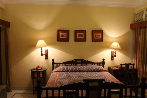 Madhuban - A Heritage Homeにあるベッド