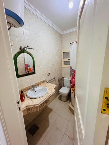 a bathroom with a sink and a toilet at Sea simple haven in Sharm El Sheikh