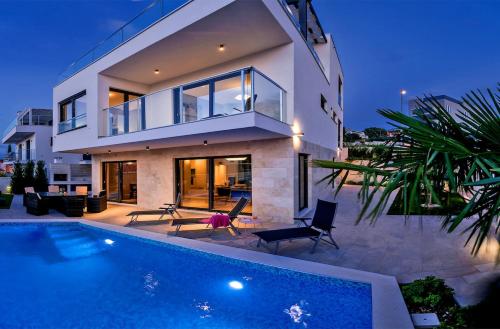 Villa TATJANA SOL with a pool, hot tub, gym