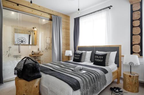 Posteľ alebo postele v izbe v ubytovaní Villa 11 Folk & Design