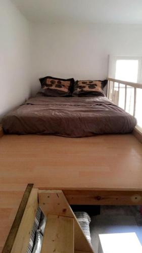Llit o llits en una habitació de Studio Gare Saint-Roch