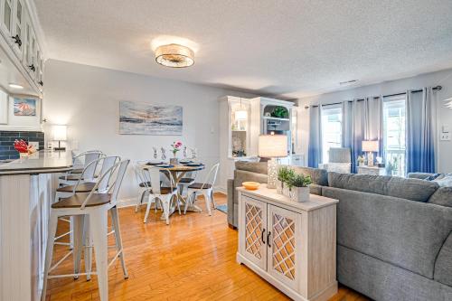 a living room with a couch and a table at Ocean Access and Balcony Surfside Beach Condo in Myrtle Beach