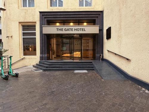 a building with the gate hotel written on it at The Gate Hotel City Centre in Tbilisi City