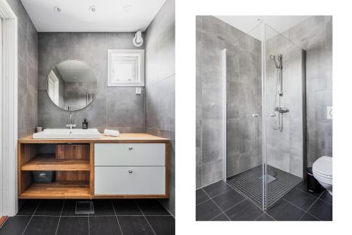 a bathroom with a shower and a sink at Skottinden Panorama Lofoten in Ballstad