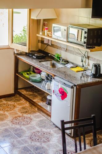 Kuchyň nebo kuchyňský kout v ubytování Duplex 