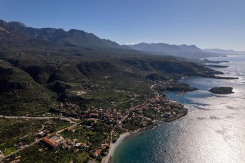 an aerial view of a city and the ocean at Achilles Cottage in Kardamyli