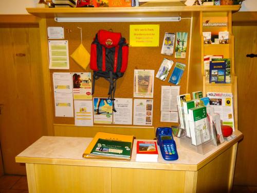 a counter in a classroom with a phone on it at Alpengasthof Moser in Karchau