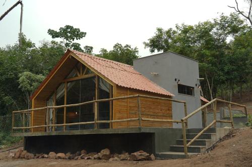 a house being constructed with a metal roof at Recanto dos Licuris in Lençóis