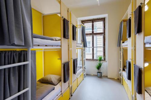 Postel nebo postele na pokoji v ubytování Flow Spaces