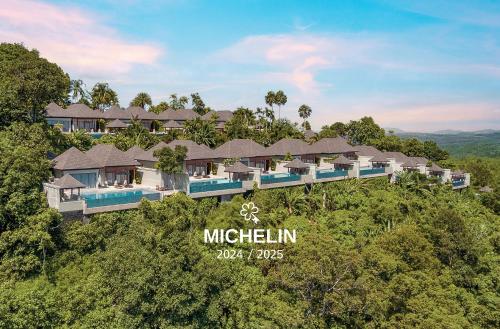 an aerial view of a resort in the jungle at The Pavilions Phuket in Bang Tao Beach