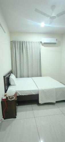 a hotel room with two beds and a window at Hangang M building in Avati