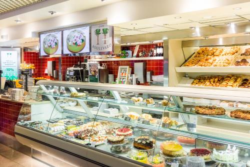 a bakery filled with lots of different types of pastries at Radisson Blu Hotel Olümpia in Tallinn