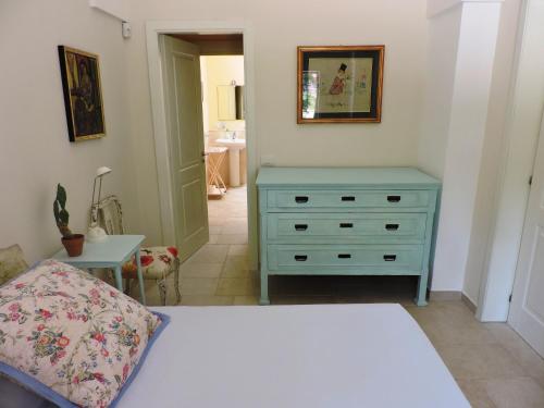 Ein Bett oder Betten in einem Zimmer der Unterkunft Villa in Salento