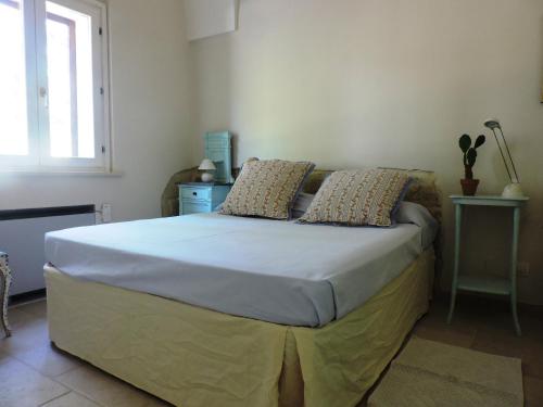 Ein Bett oder Betten in einem Zimmer der Unterkunft Villa in Salento