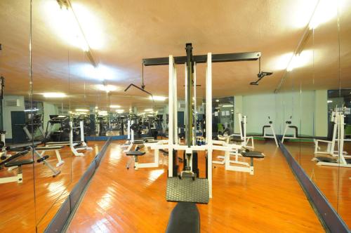a gym with a lot of exercise equipment in it at Grand Aquarium in Marmaris