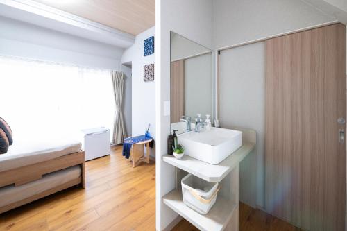 Llit o llits en una habitació de Pagi Hotel