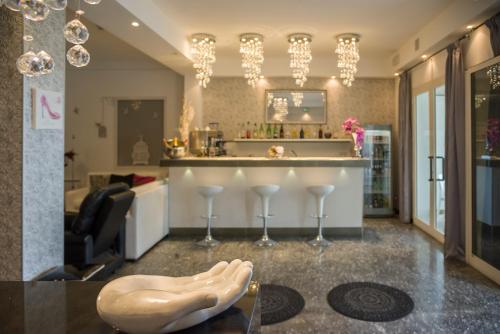 Lounge nebo bar v ubytování Hotel Vela D'Oro