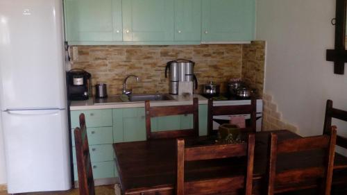 Η κουζίνα ή μικρή κουζίνα στο Apartment with Private Pool