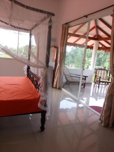 Postel nebo postele na pokoji v ubytování Villa Jungle Paradise