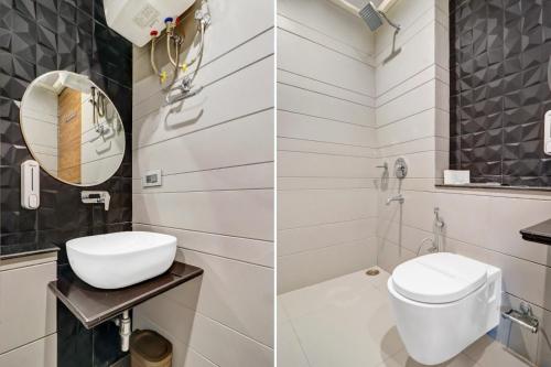 a bathroom with a toilet and a sink and a mirror at Hotel Grand Kings Premium in New Delhi