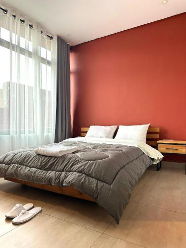 Lova arba lovos apgyvendinimo įstaigoje Maison Rouge