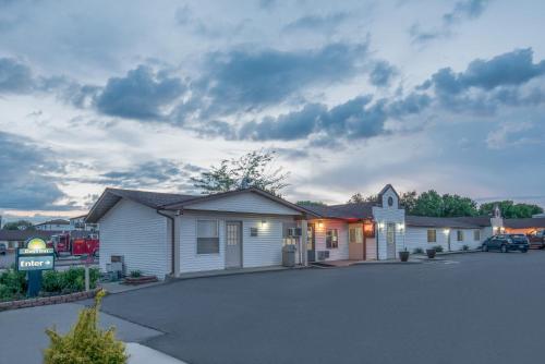 a building with a parking lot in front of it at Days Inn by Wyndham Jamestown in Jamestown