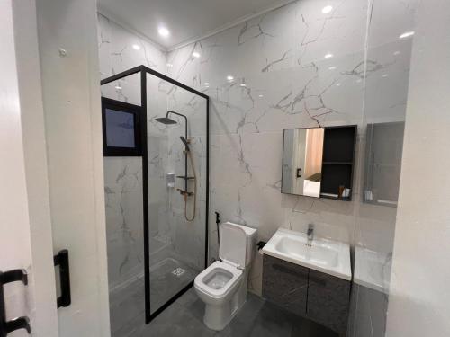 Kylpyhuone majoituspaikassa Hotel La Roche