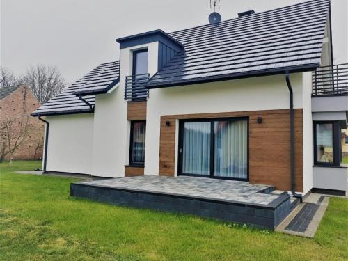 Apartment Gemütliches Ferienhaus mit Garten und Seeblick by Interhome