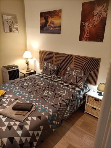 Llit o llits en una habitació de Le St Nicolas
