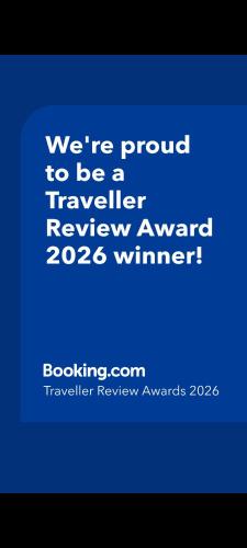 a blue sign that says were proud to be a travellerreviewagencyagencyagency at Appartement Amalia Sal Santa Maria in Prainha