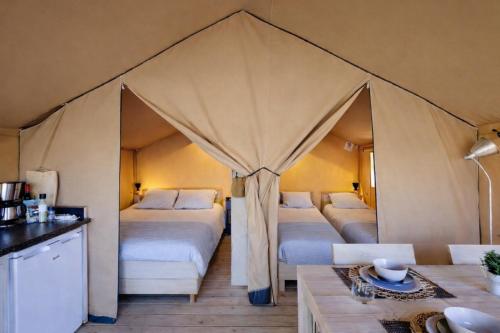Llit o llits en una habitació de Camping Mercone