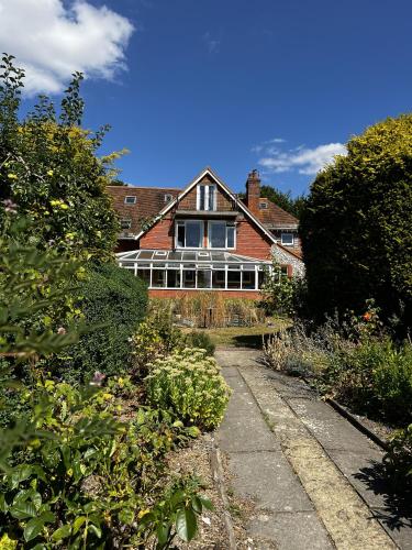 a house with a pathway in front of it at Stonehenge Farmhouse in Salisbury