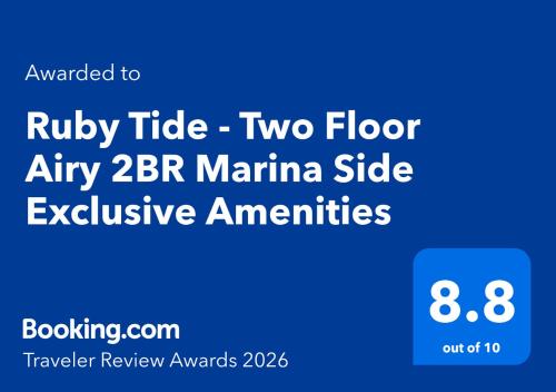 a blue sign with the words ruby tribe two floor at a two floor at at Ruby Tide - Two Floor Airy 2BR Marina Side Exclusive Amenities in Los Angeles
