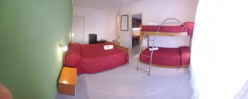 a room with two bunk beds in a room at Casa Floriani Fiavè-Comano Terme green in Fiavè