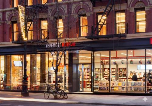 a store front of a building on a city street at Comfortable 2BR & 2 Bath Apt in Downtown NYC in New York