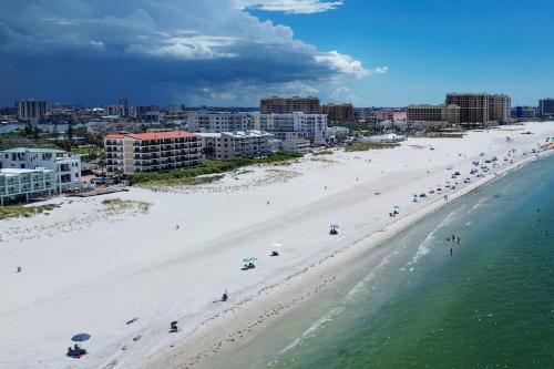 an aerial view of a beach with people on it at 201 Surfside in Clearwater Beach