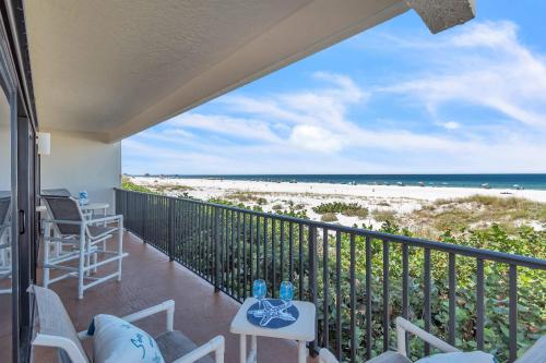 a balcony with a view of the beach at 201 Surfside in Clearwater Beach